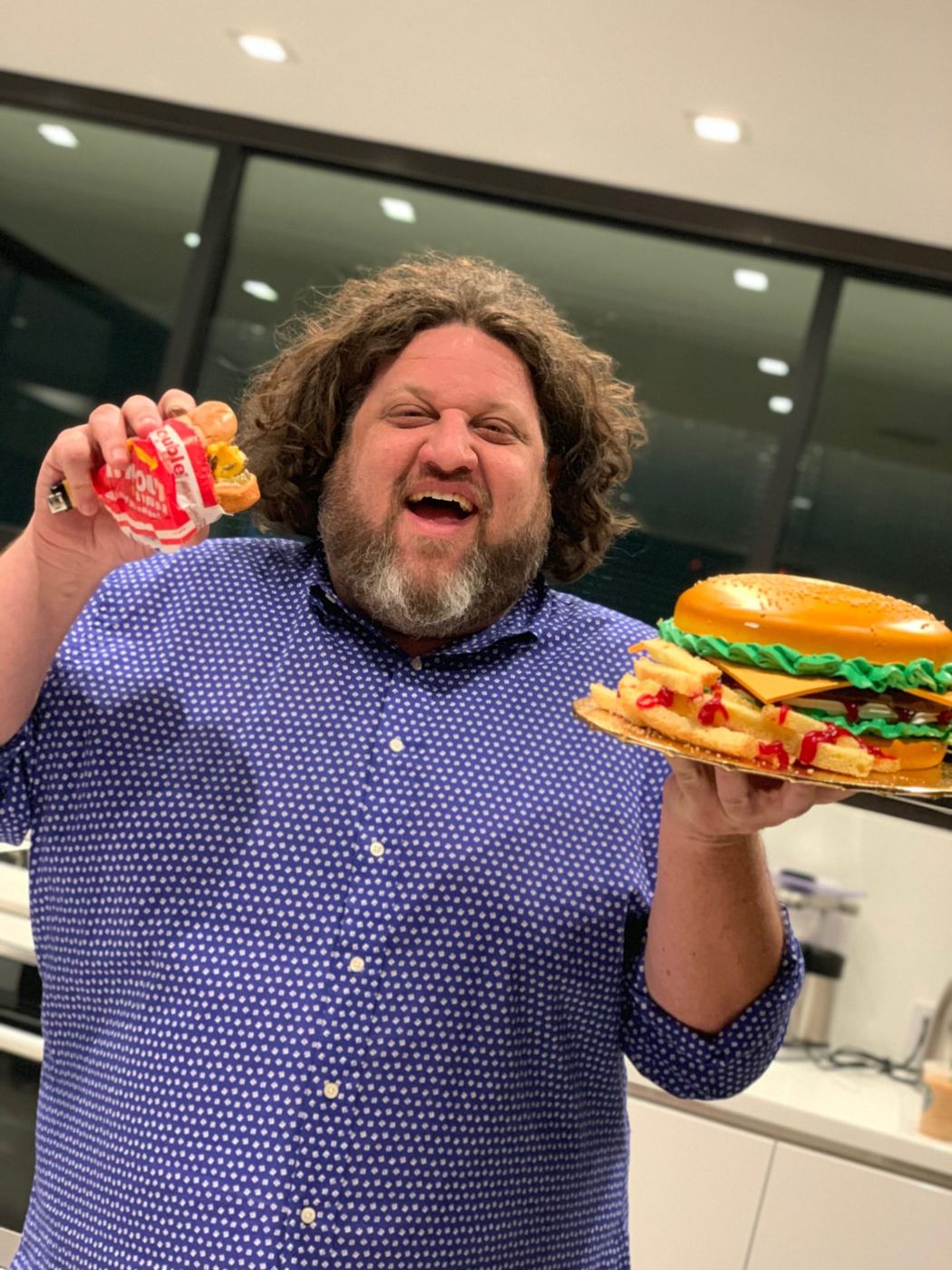 Aaron with a burger cake